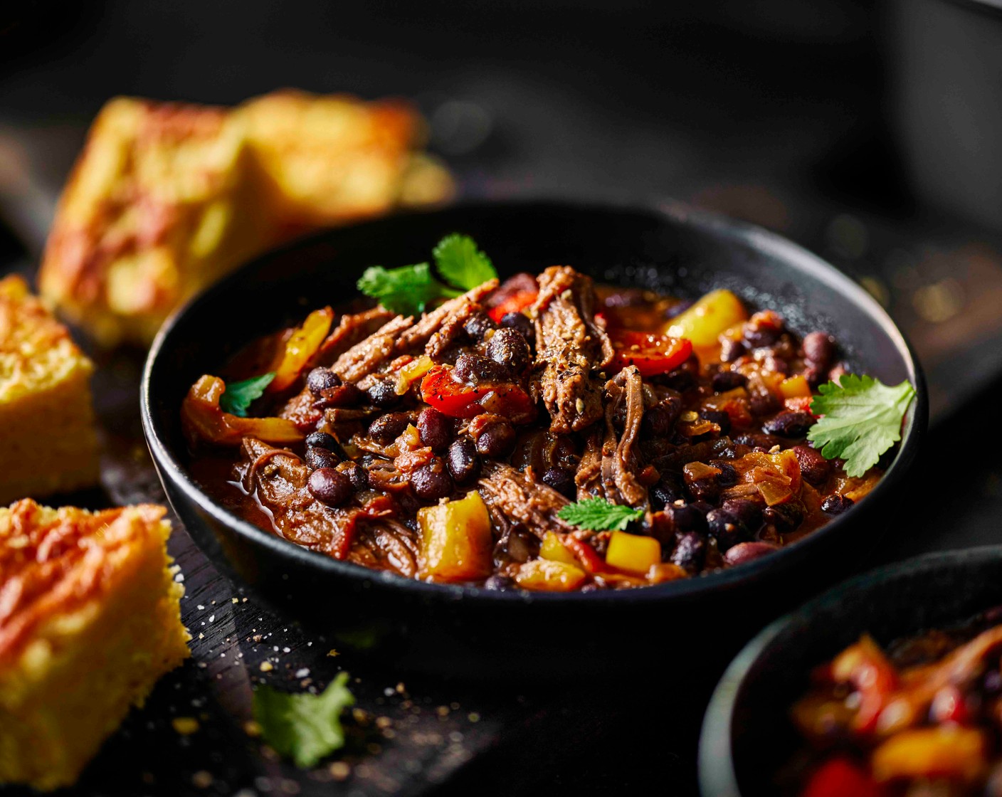 step 7 Leave to cool for 5 minutes before cutting into squares. Serve the brisket chilli in bowls with the warm cheesy cornbread alongside.