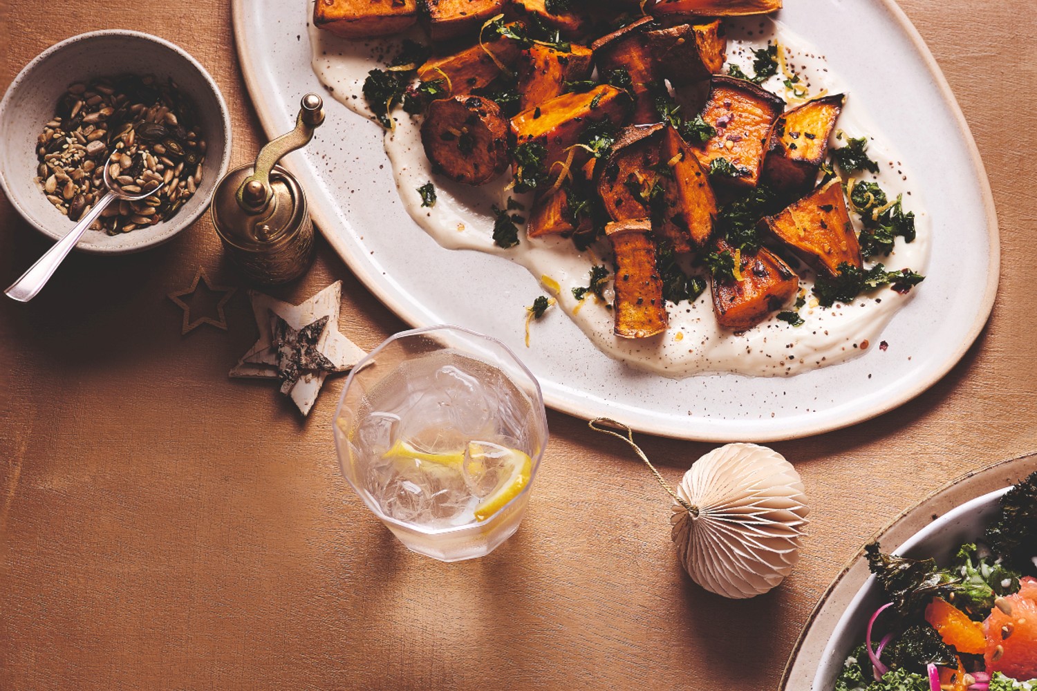 Roasted sweet potatoes with herby smash and yogurt dressing