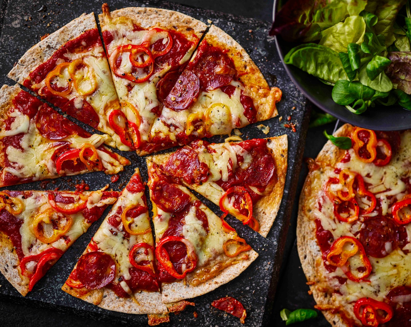 step 4 Bake for 5-10 minutes, until the cheese has melted and the edges of the tortilla are golden. Serve straightaway with a green salad, if you like.
