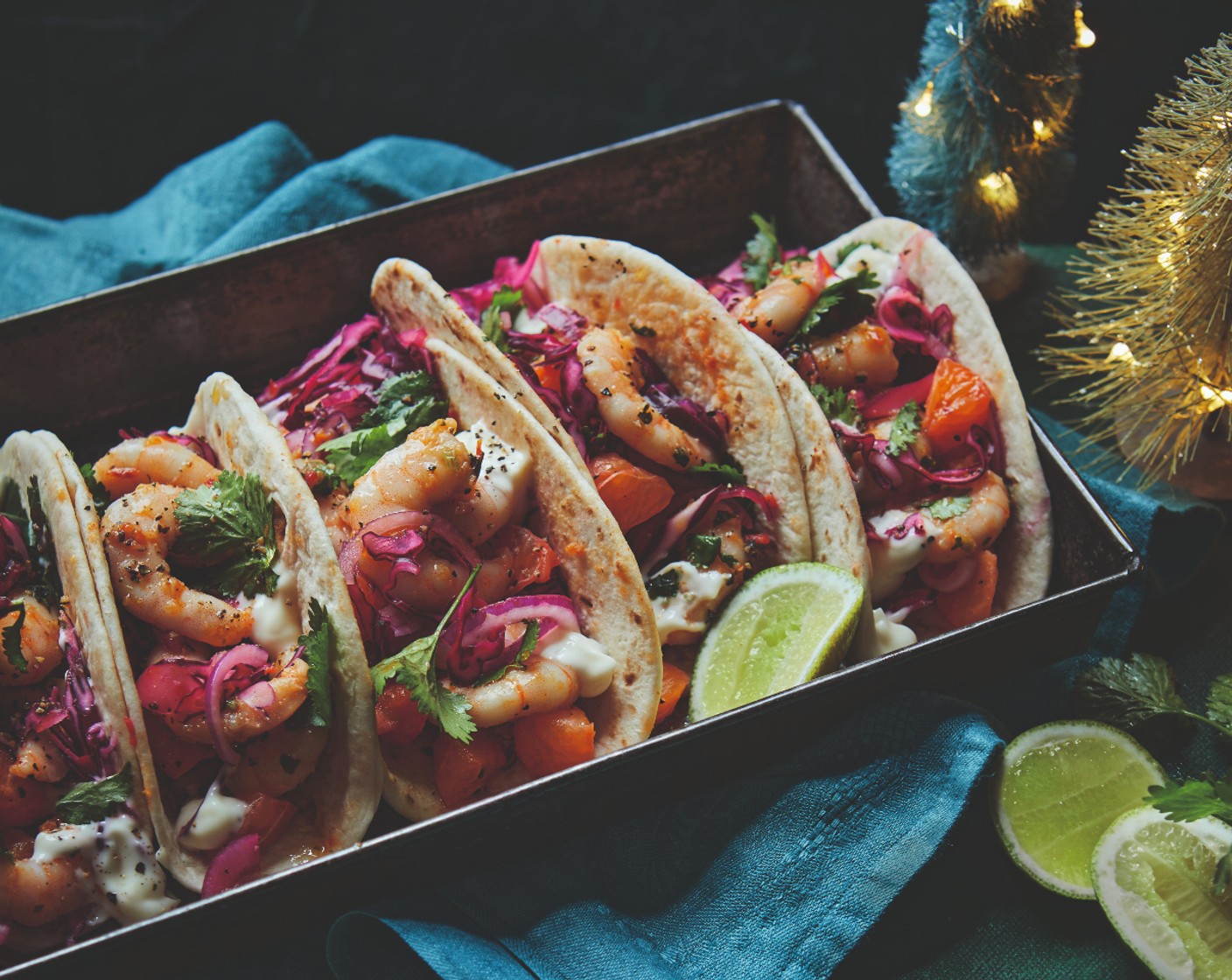 step 4 Build your tacos with a spoonful of the lemon mayo (1 tbsp), the salsa and the prawns. Serve with the lime wedges for squeezing over and some hot sauce, if you like.
