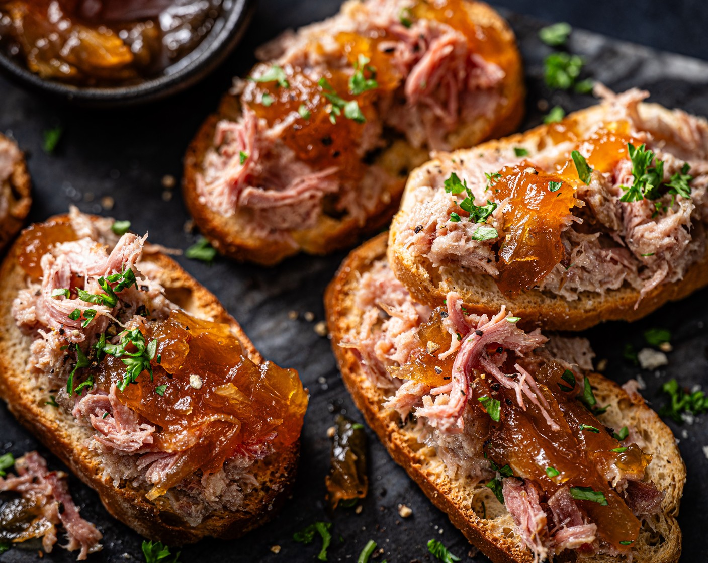 step 1 Spread the bruschettine (12) with the duck rillette (1 pack) and top each with a spoonful of ale and onion chutney (12 tsp) and a scattering of fresh parsley (5 g). Finish with some cracked black pepper.