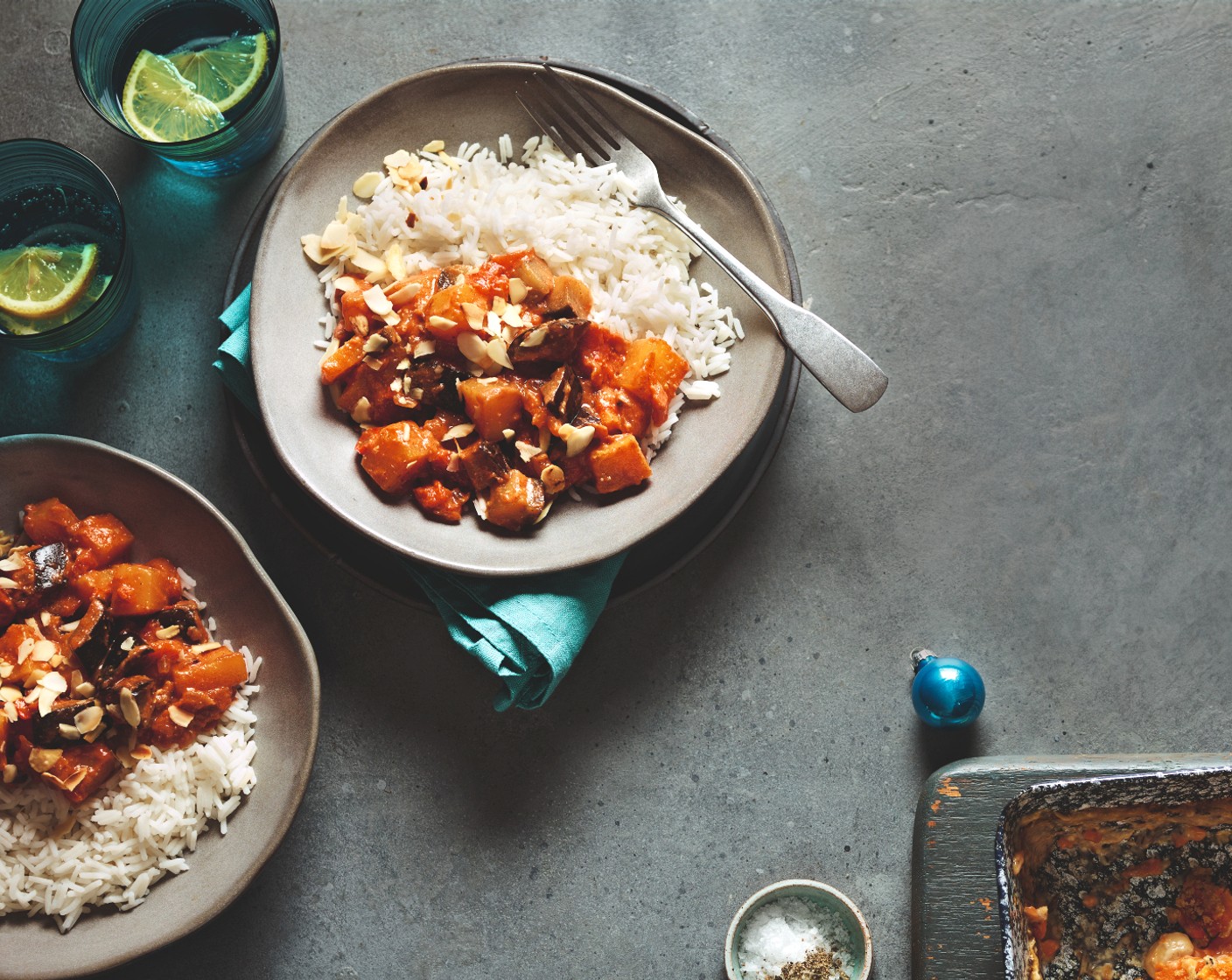 step 4 When the curry has nearly finished cooking, stir in the spinach (80 g) and allow it to wilt. Serve the curry alongside the rice, scattered with the almond flakes.