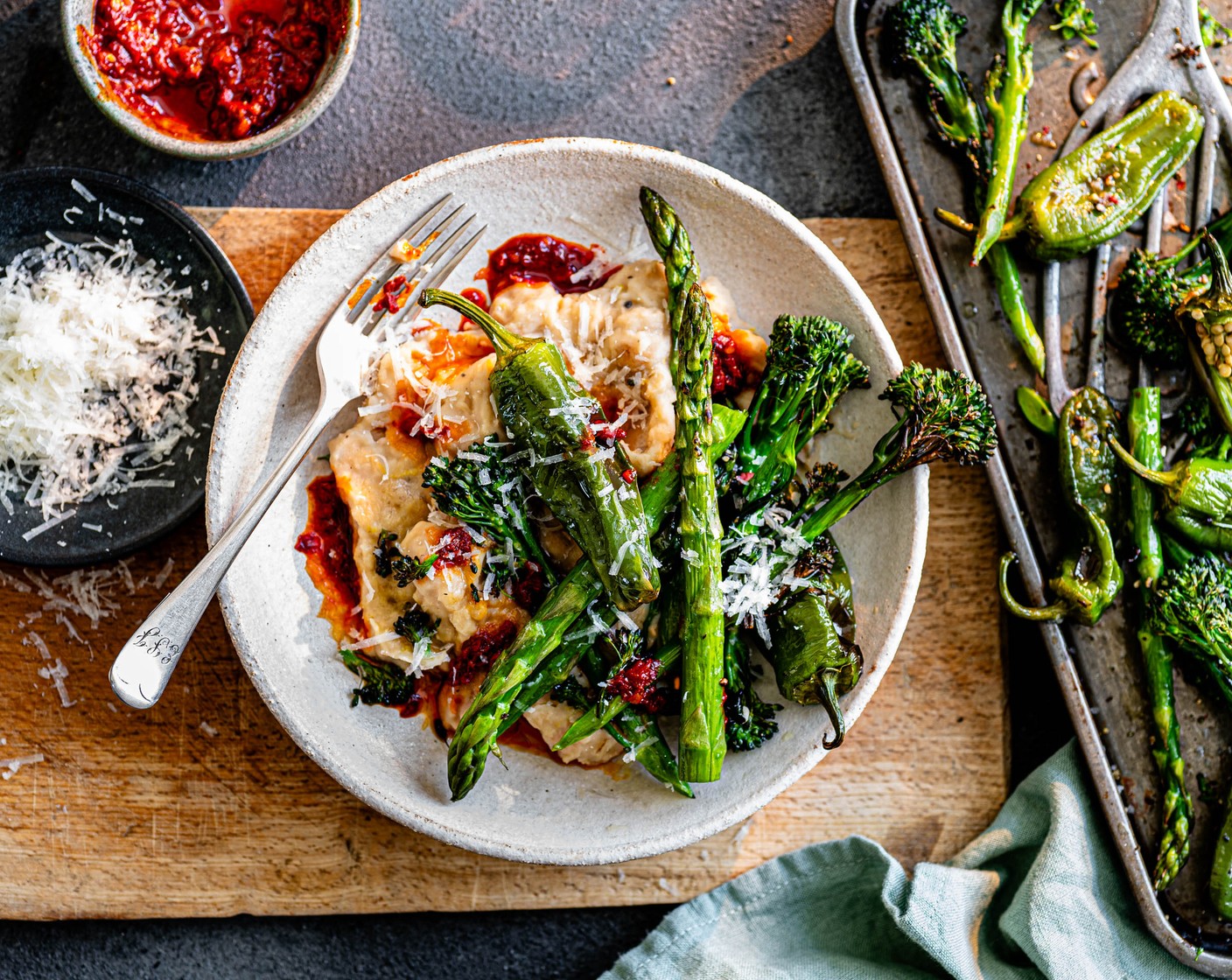 step 5 Spoon your creamy beans into a warm bowl, top with the roasted veg, sprinkle over parmesan (30 g) and finish with 'nduja.