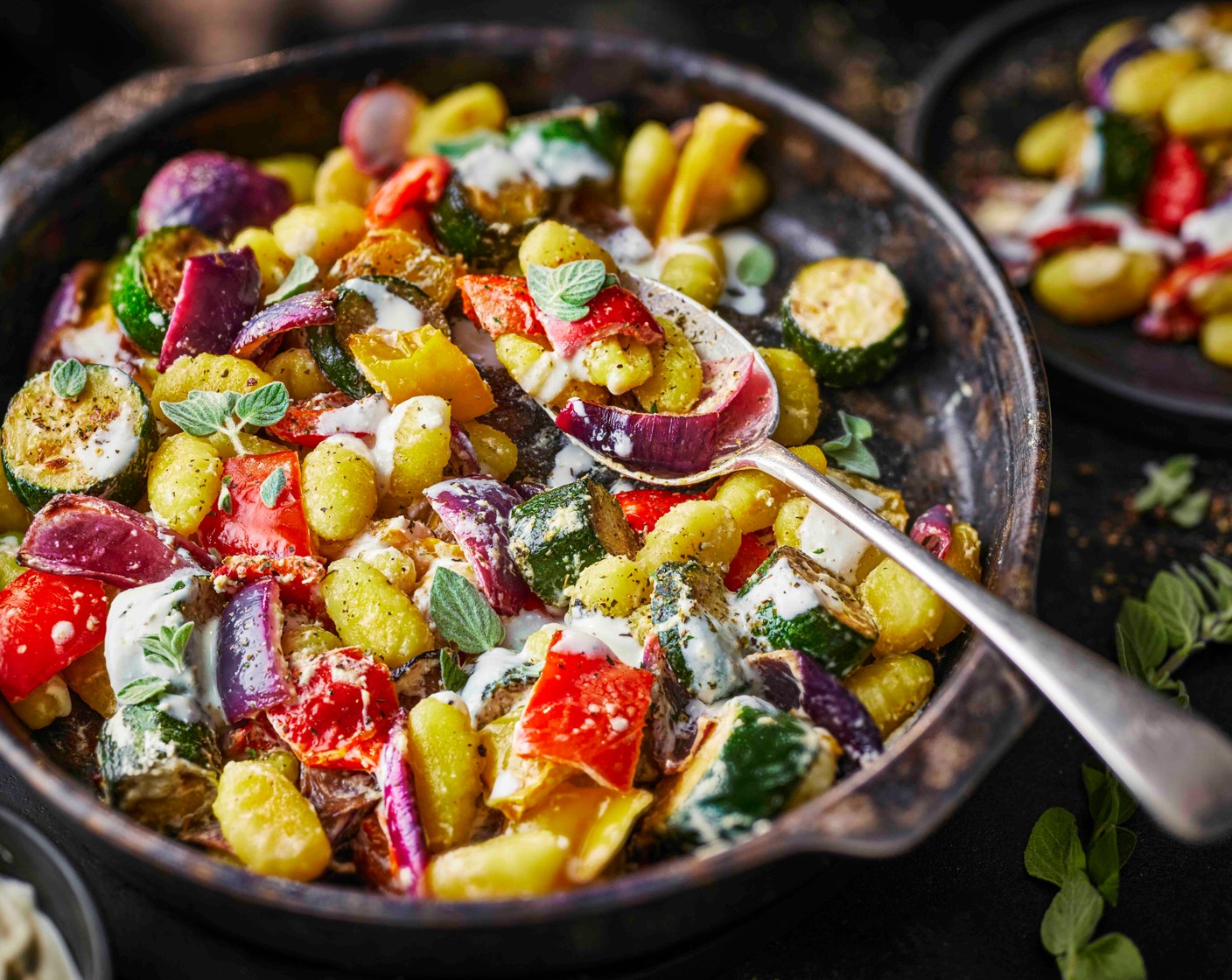 step 3 Remove the gnocchi from the oven, stir through the whipped feta (1 pack) and Greek seasoning (2 tbsp) and serve with an additional sprinkle of Greek seasoning on top.