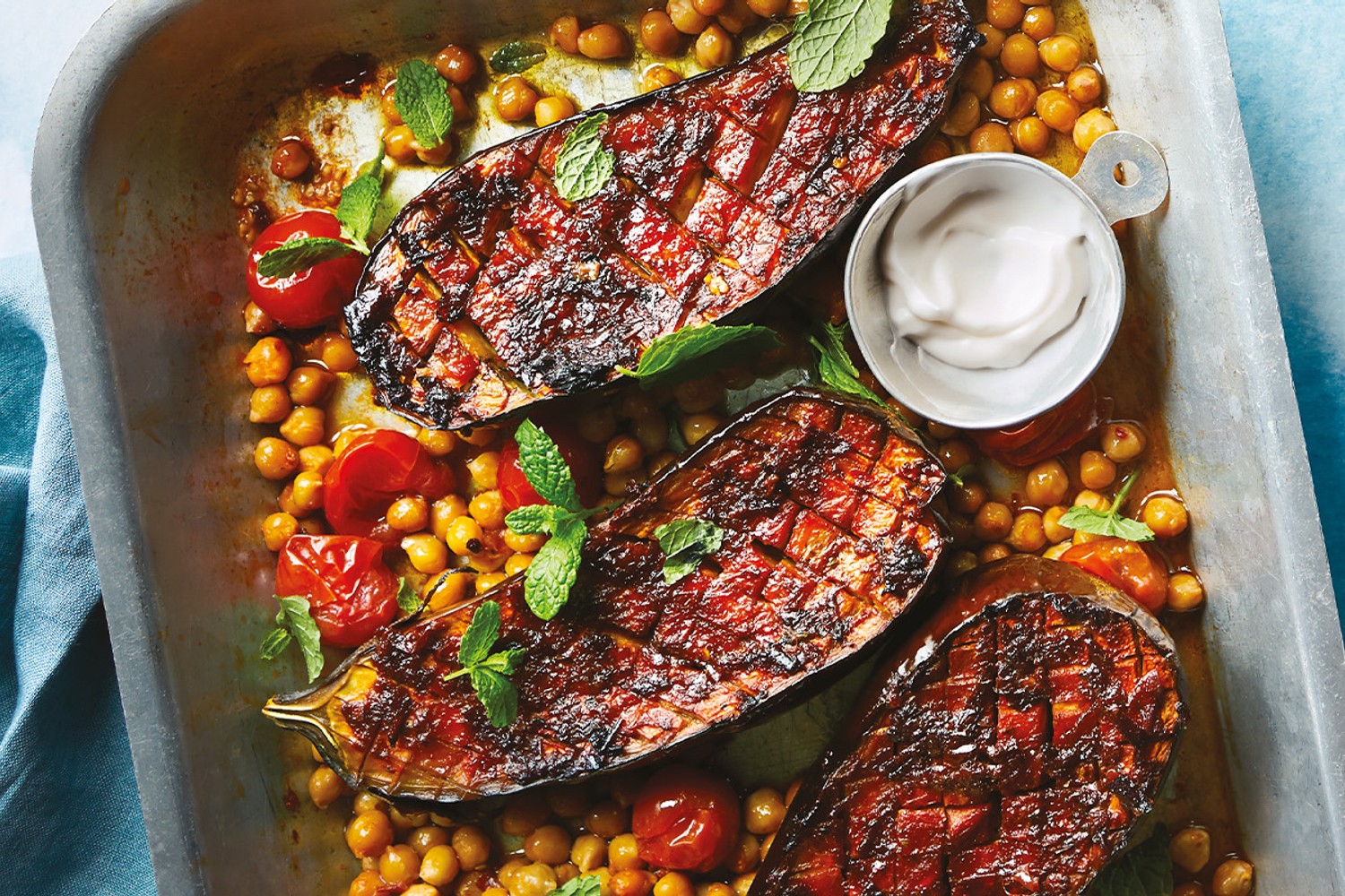 Sticky harissa-baked aubergine with crispy chickpeas