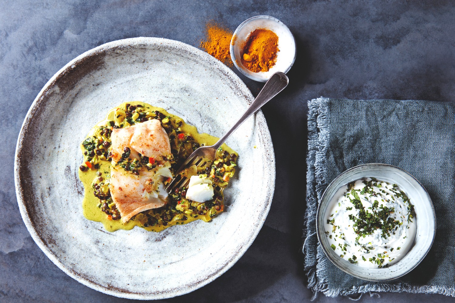 Indian-spiced Norwegian cod with coconut and black lentils
