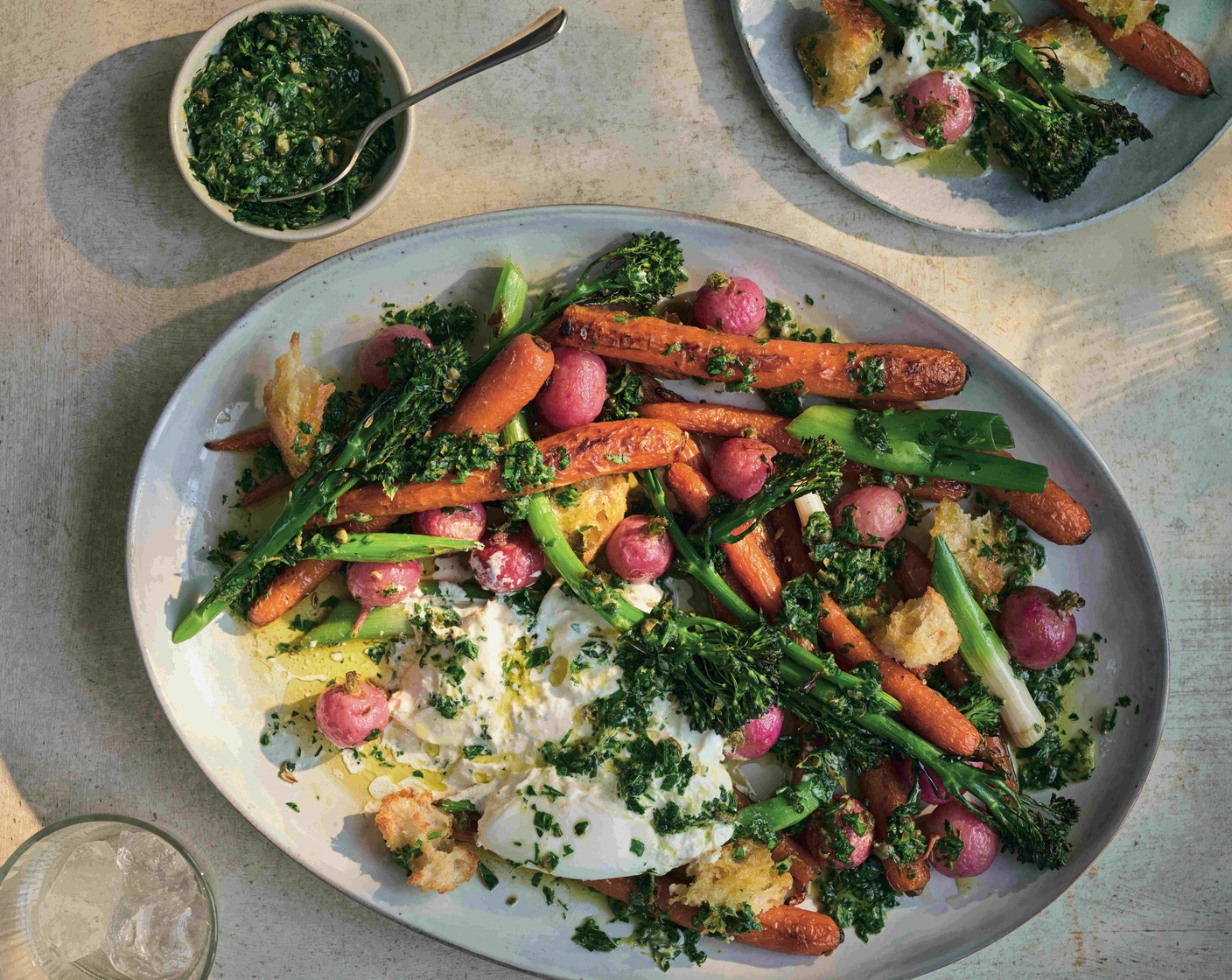 step 3 Meanwhile, combine the capers (1 tbsp), garlic (1 clove), parsley (12 g), mint (12 g) and lemon juice and zest (1/2) along with 2 tbsp olive oil and season to taste. Serve the vegetables and ciabatta croutons on a large platter with the torn burrata (1), drizzled with the dressing.