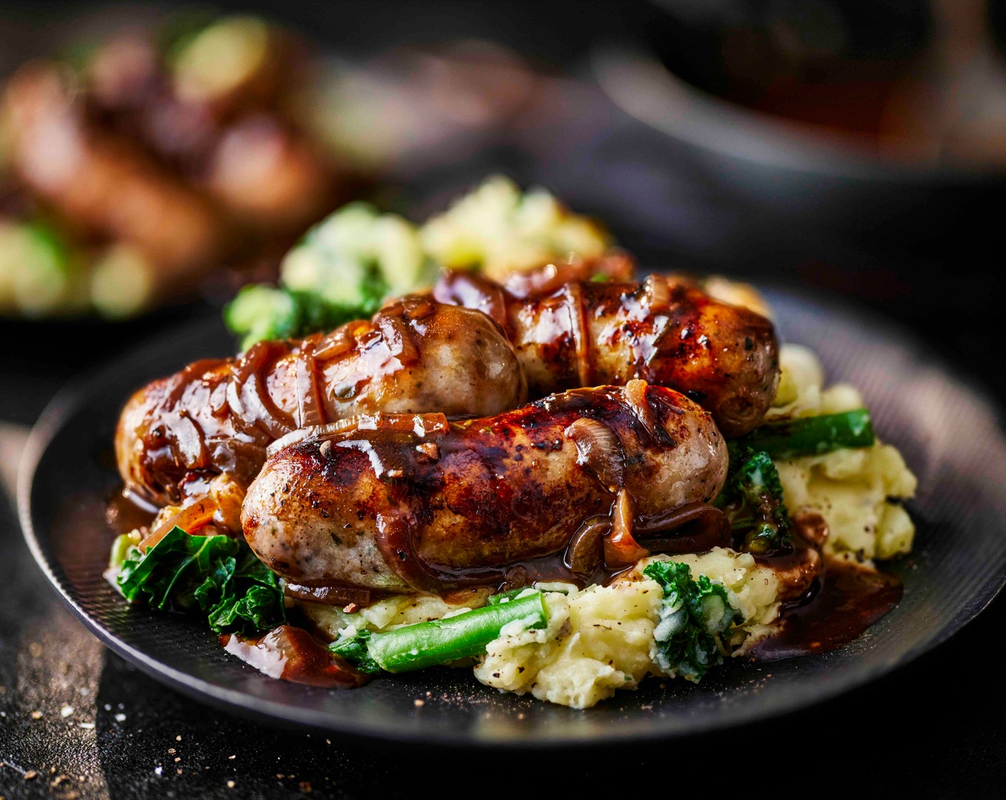 step 8 Serve the sausages alongside the mash, spooning over the gravy.