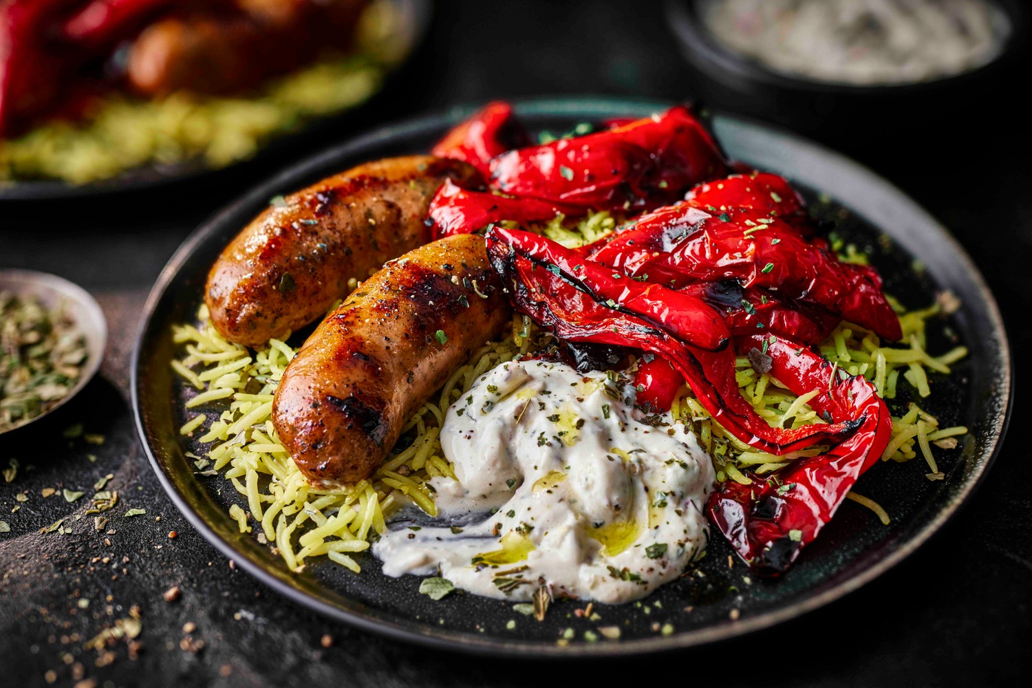 Sticky paprika sausages with lemon rice