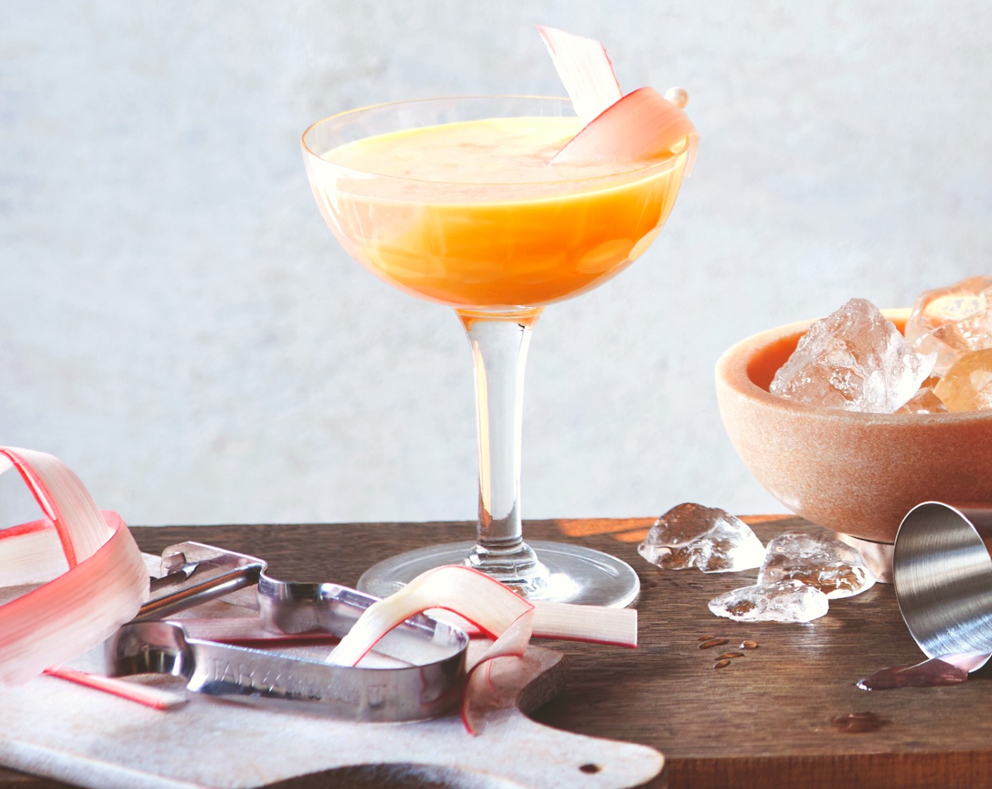 step 5 Remove the martini glasses from the freezer. Mix the syrup with the M&S rhubarb gin (100 ml) and pour this into the glasses, then pour over the custard. Finish each cocktail with the ribbons of fresh rhubarb.