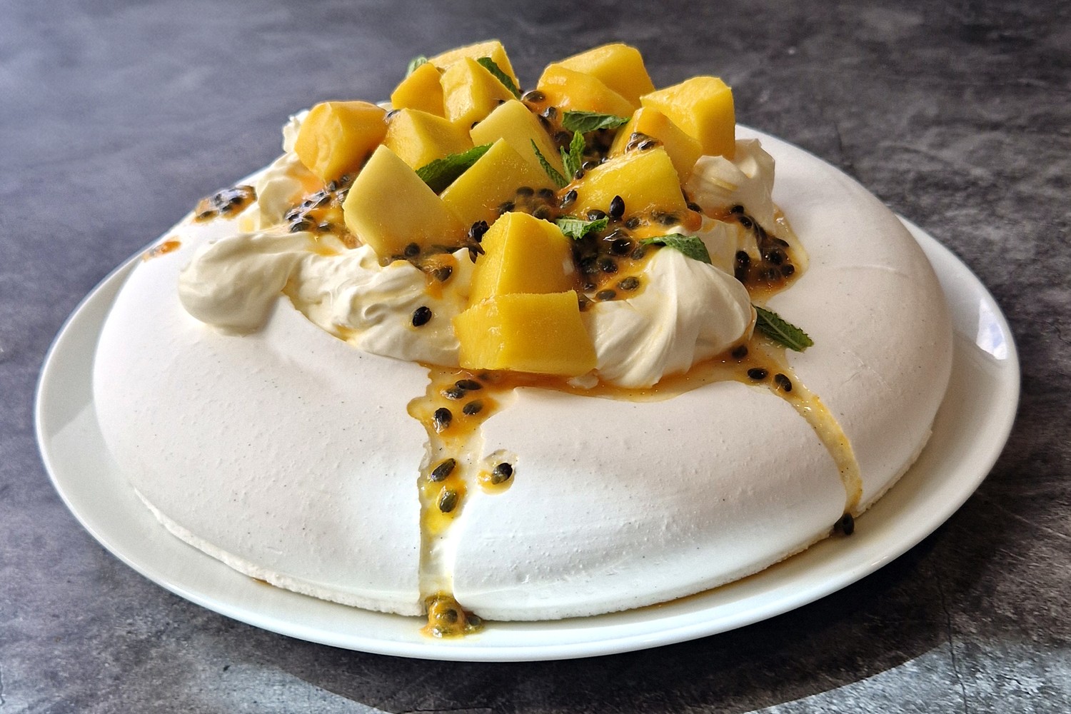 Mango and passion fruit pavlova
