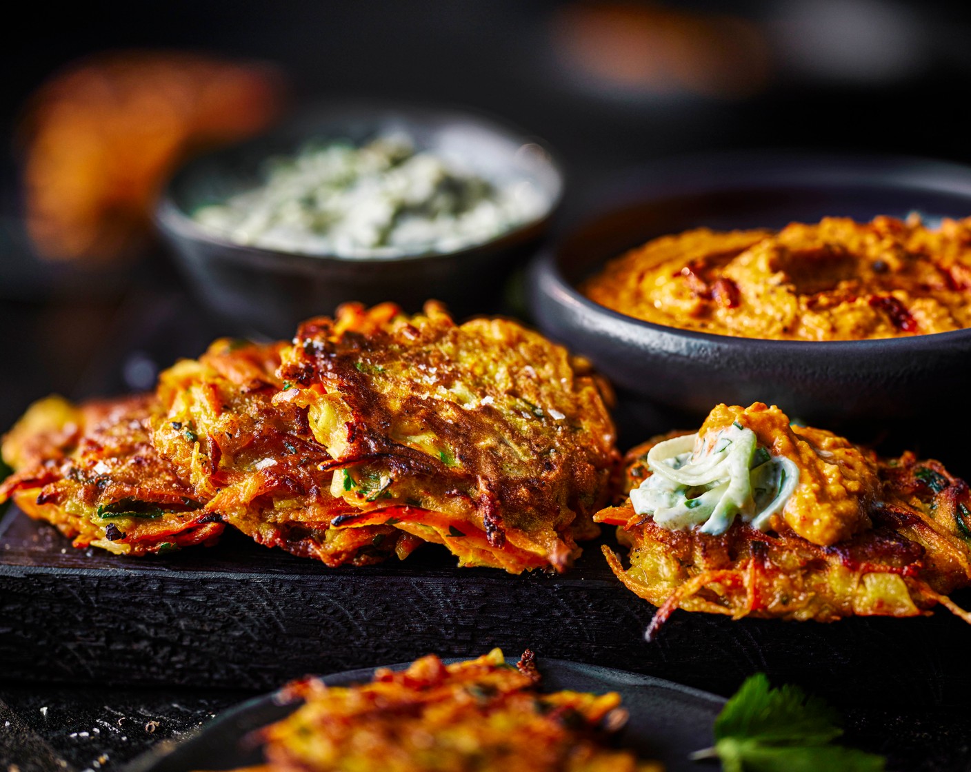 step 6 Serve warm with the houmous and yogurt dip for dunking.