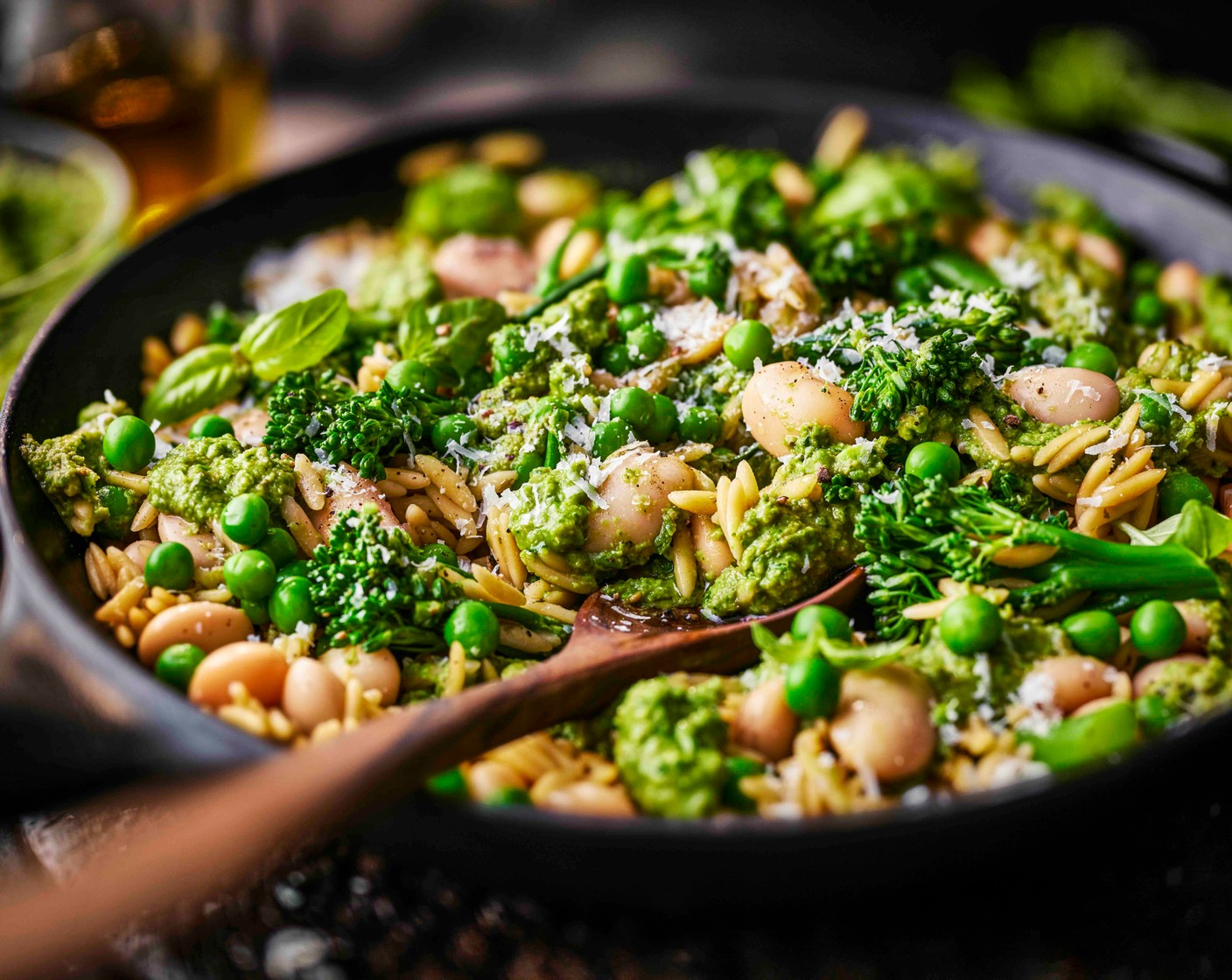 step 4 Remove the pan from the heat, stir through the pea pesto and season to taste. Serve topped with the grated Parmesan (70 g) and the torn basil leaves (15 g).
