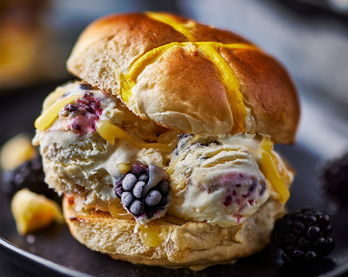 step 5 Remove from the freezer 10 minutes prior to serving to let the ice cream soften a little bit. To serve, toast a lemon hot cross bun (as needed) and dollop the ice cream on top.