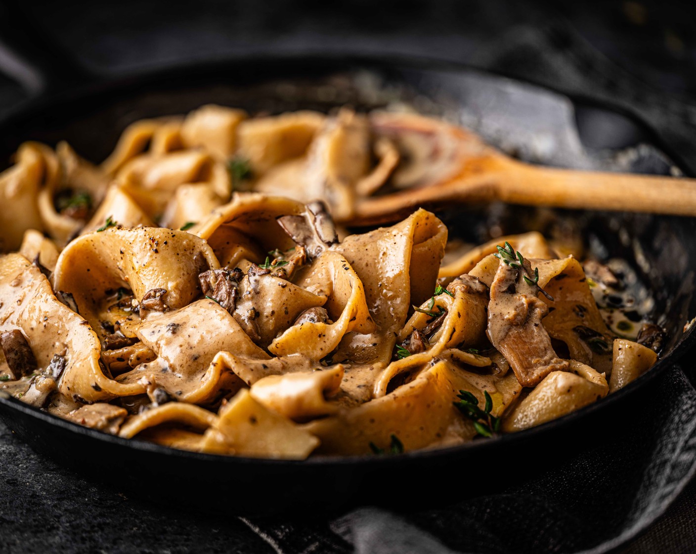 step 8 Remove the pasta with tongs or a slotted spoon and add the pasta straight to the mushroom sauce. Toss to coat and then serve immediately, with some more thyme scattered on top.