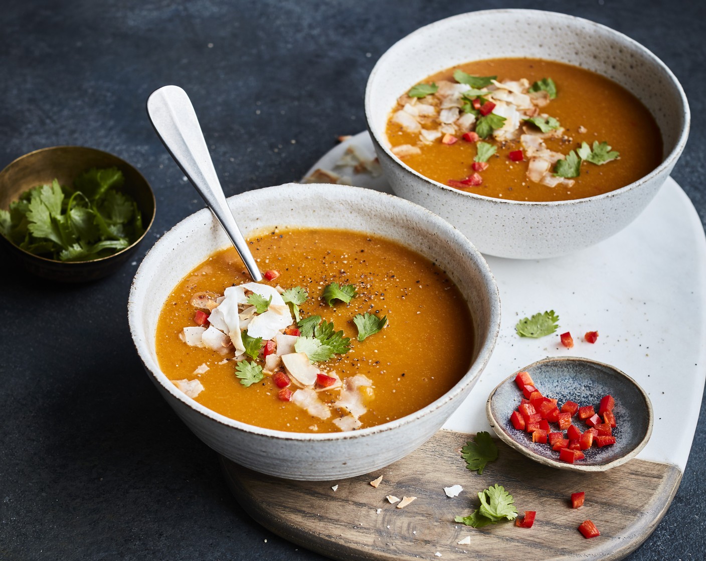 step 4 If serving hot, return to a clean saucepan and heat through; alternatively serve cold. Either way, scatter over the coriander (to taste) and red chilli (1); if liked, to serve.