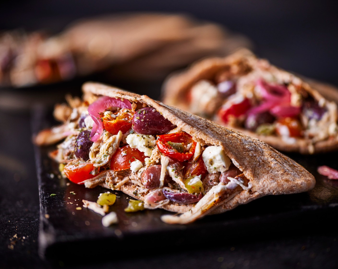 step 3 Lightly toast the pittas (4), then stuff with the chicken filling. Add in some pickled red onions (1 tbsp) for crunch, if you’d like.