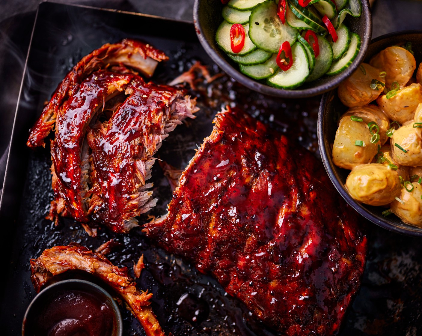 step 5 Serve the ribs alongside the potato salad and quick pickled cucumbers.