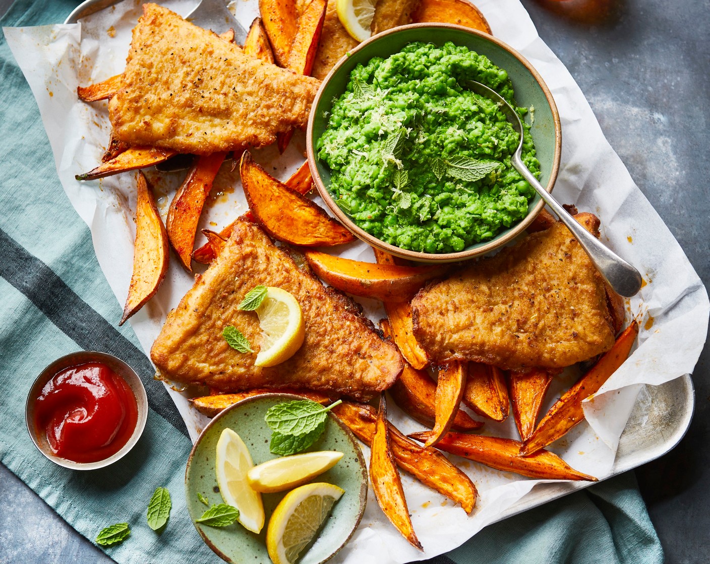 step 4 Serve each piece of fish with some of the sweet potato wedges and peas.