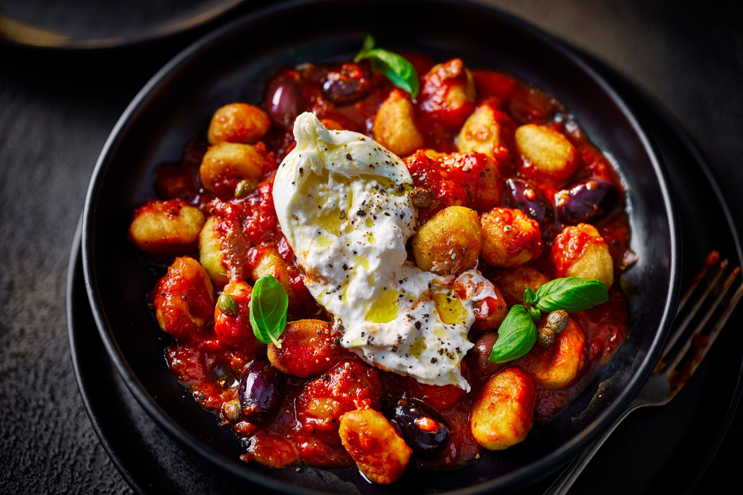 Crispy gnocchi puttanesca with burrata