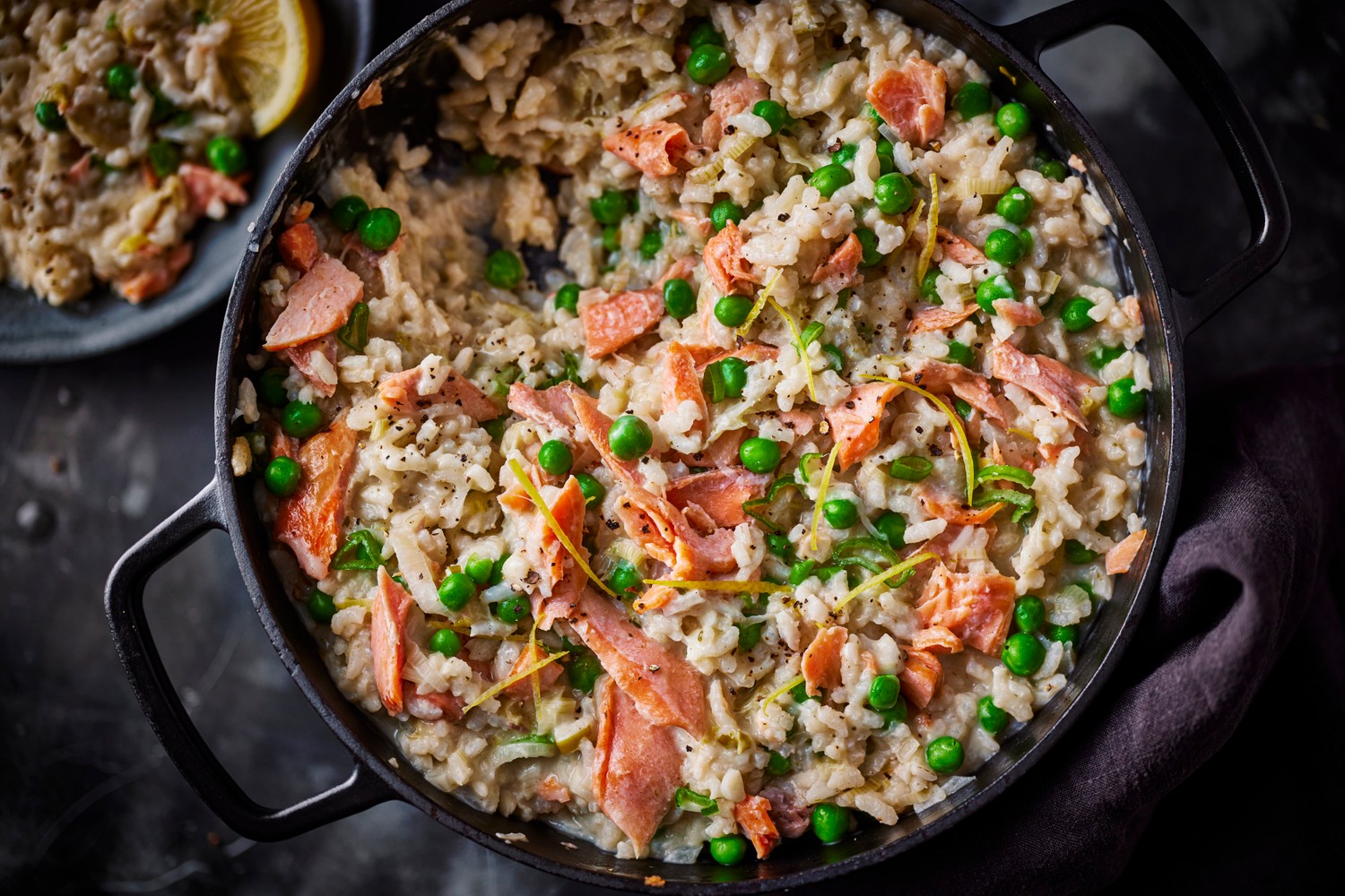 Oven-baked smoked trout and spring onion risotto