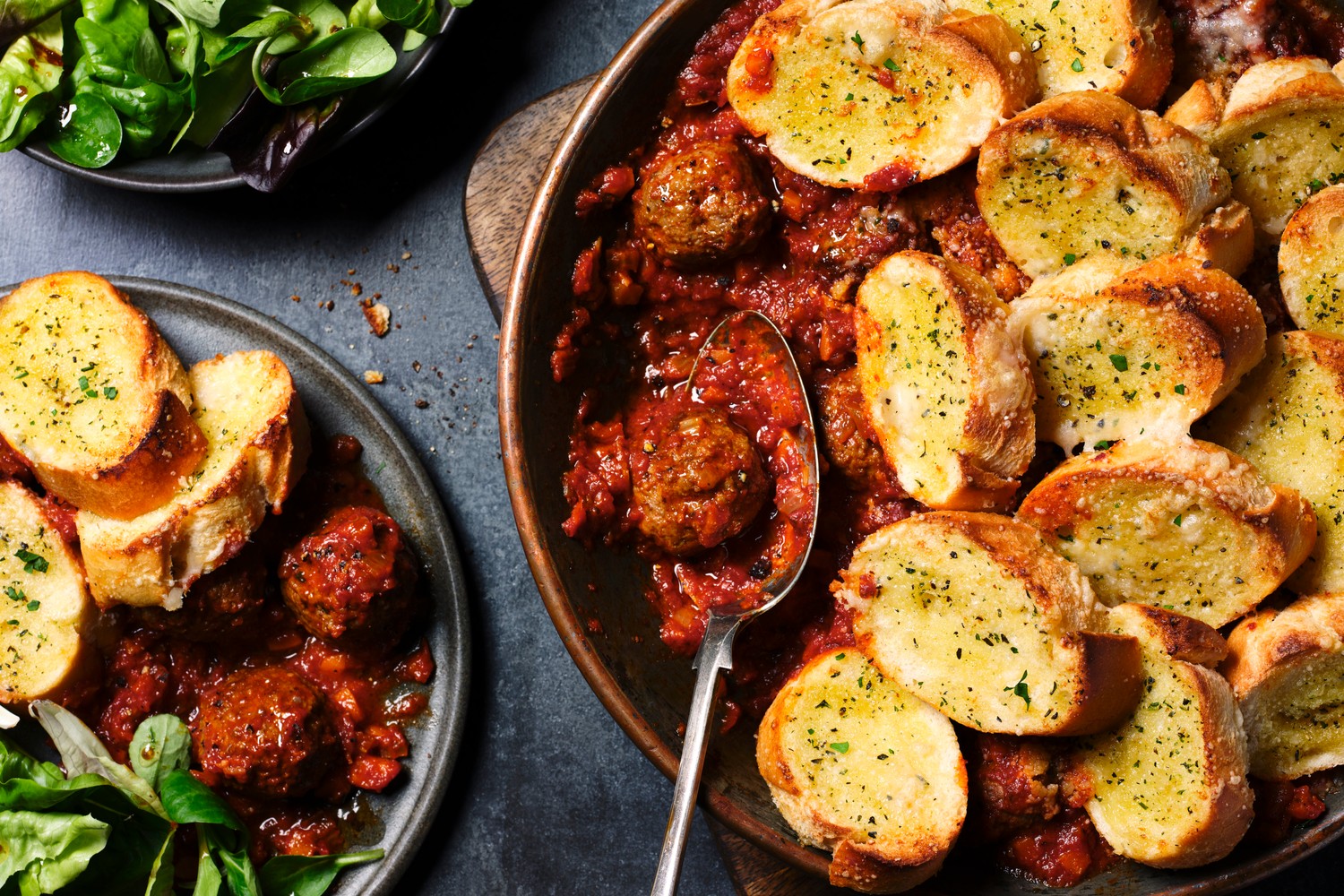 Garlic-bread topped meatball traybake