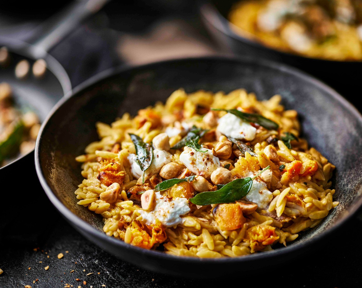 step 6 Divide between bowls and crumble over the goat's cheese (1 pack). Spoon over the brown butter, hazelnuts and crispy sage to serve.