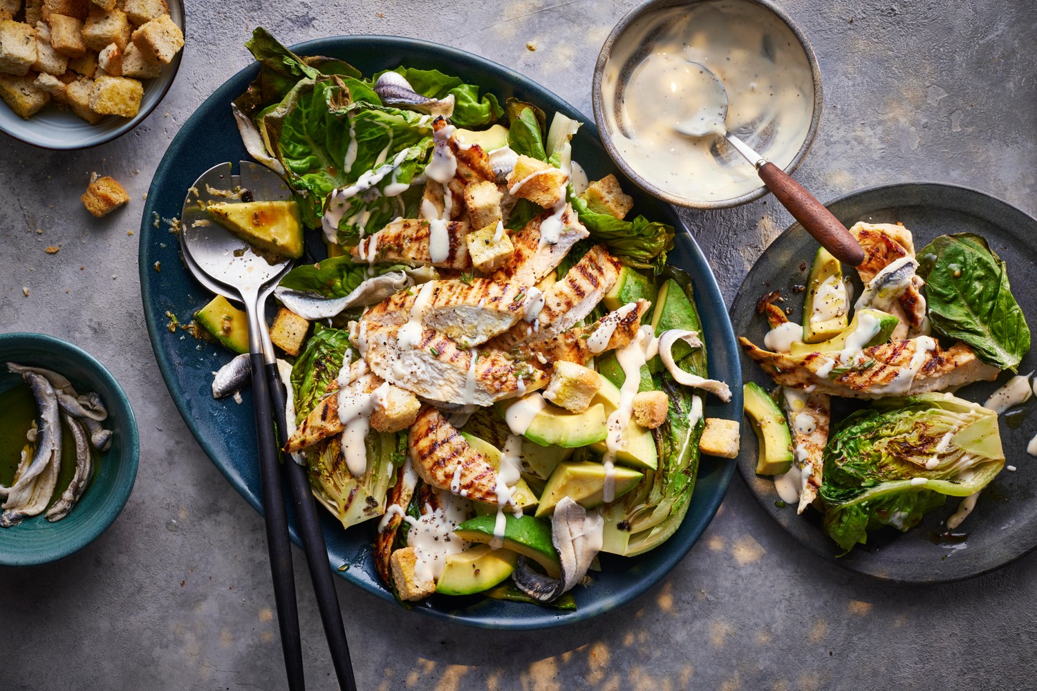 Grilled gem lettuce, chicken and avocado Caesar salad