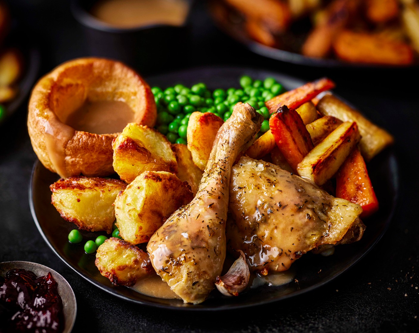 step 9 Cut the chicken legs into thighs and drumsticks. Dish up the carrots, parsnips, roast potatoes, Yorkshire puddings and roast chicken. Pour over the gravy and dig in.