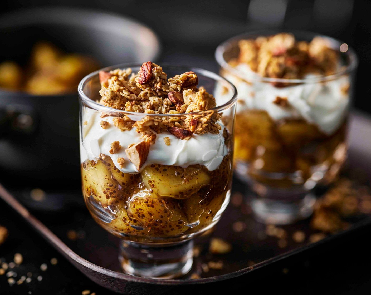 step 5 Decant the apple mixture into four ramekins. Top with a layer of yogurt (200 g), then the oaty crumble mix. Keep in the fridge, ready to enjoy as needed, or eat straight away.