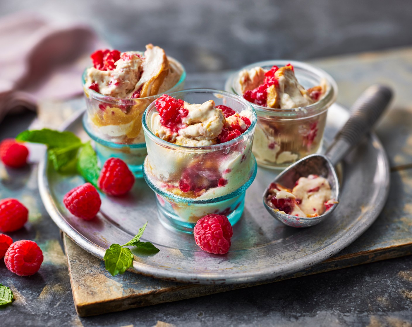 step 3 Smash the M&S Collection sapphire raspberries (75 g) with a fork and swirl through the banana mix to serve.