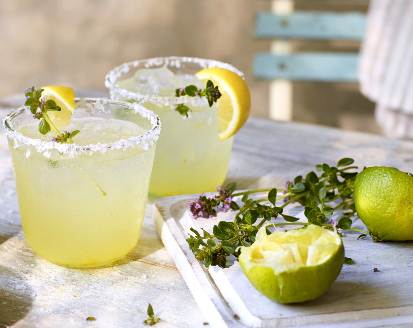 step 3 Strain into two cocktail glasses (coat the rims in salt first), and garnish with a wedge of M&S Remarksable Value lemon (1) and a sprig of thyme (2 sprigs).