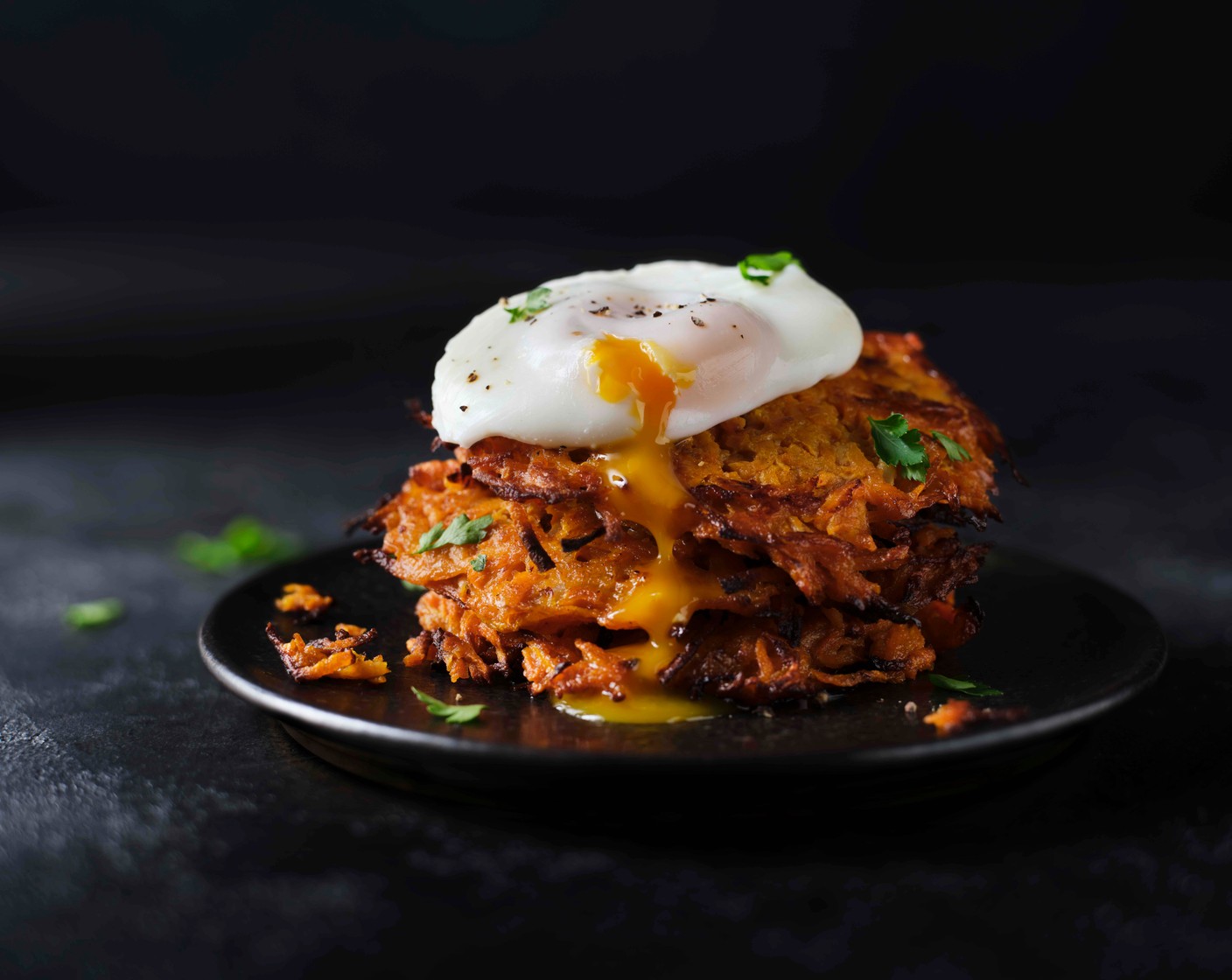 step 5 Serve the hash browns with the poached eggs on top, finishing with a little parsley (1 handful) and lemon wedges (1/2) for squeezing over.
