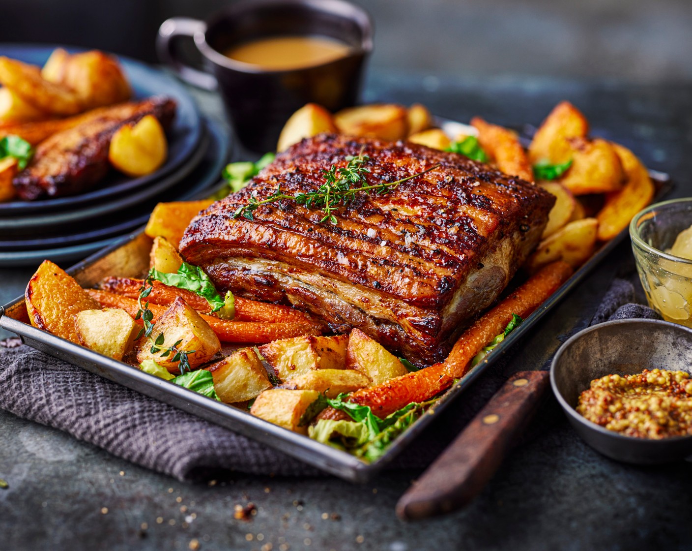 step 6 Slice the pork and serve with the roast vegetables, gravy (to taste) and apple sauce (to taste) or mustard.