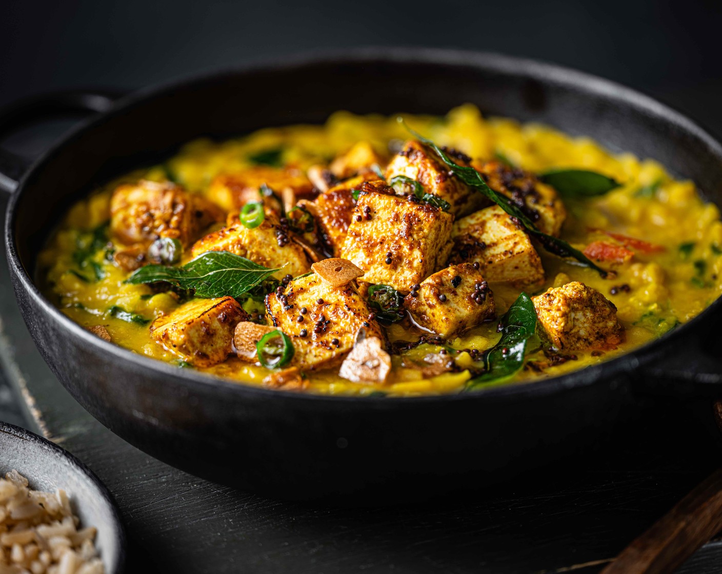 step 9 Serve the dal with the rice, tofu, and some fresh coriander (10 g).