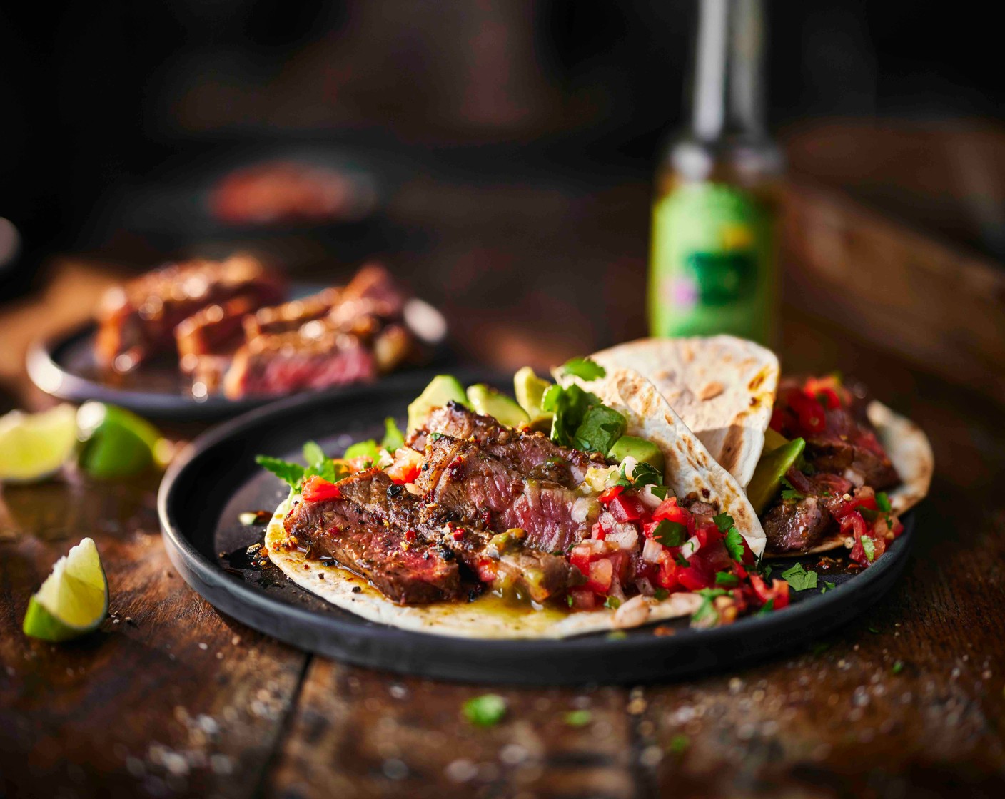 step 6 Slice the rested steak against the grain and arrange on a serving platter. Sprinkle with a little extra coriander. Serve with the warm tacos, pico de gallo, avocado and the jalapeño, Bramley apple and lime hot sauce (to taste), letting everyone build their own.