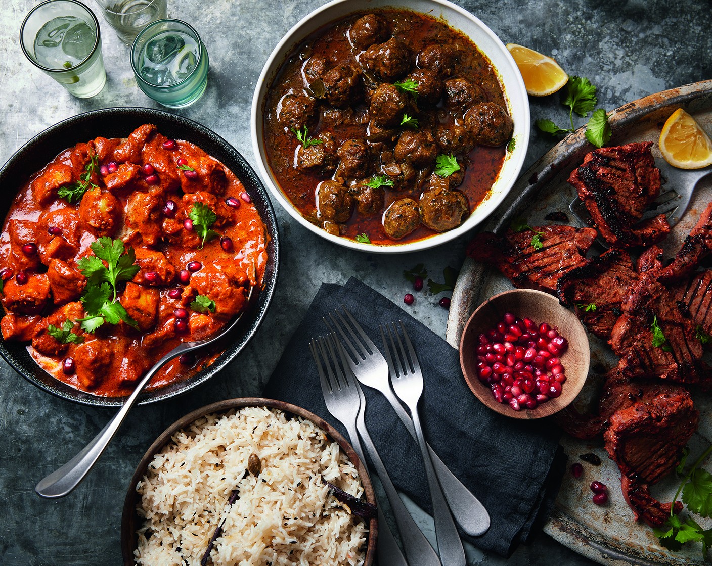 step 12 Increase the heat on the sauce and add the meatballs. Cook for 5-6 minutes. Add the crème fraîche (200 g) and stir. Scatter over the coriander (1 handful). Serve everything hot on a thali tray or in separate bowls for everyone to share from.