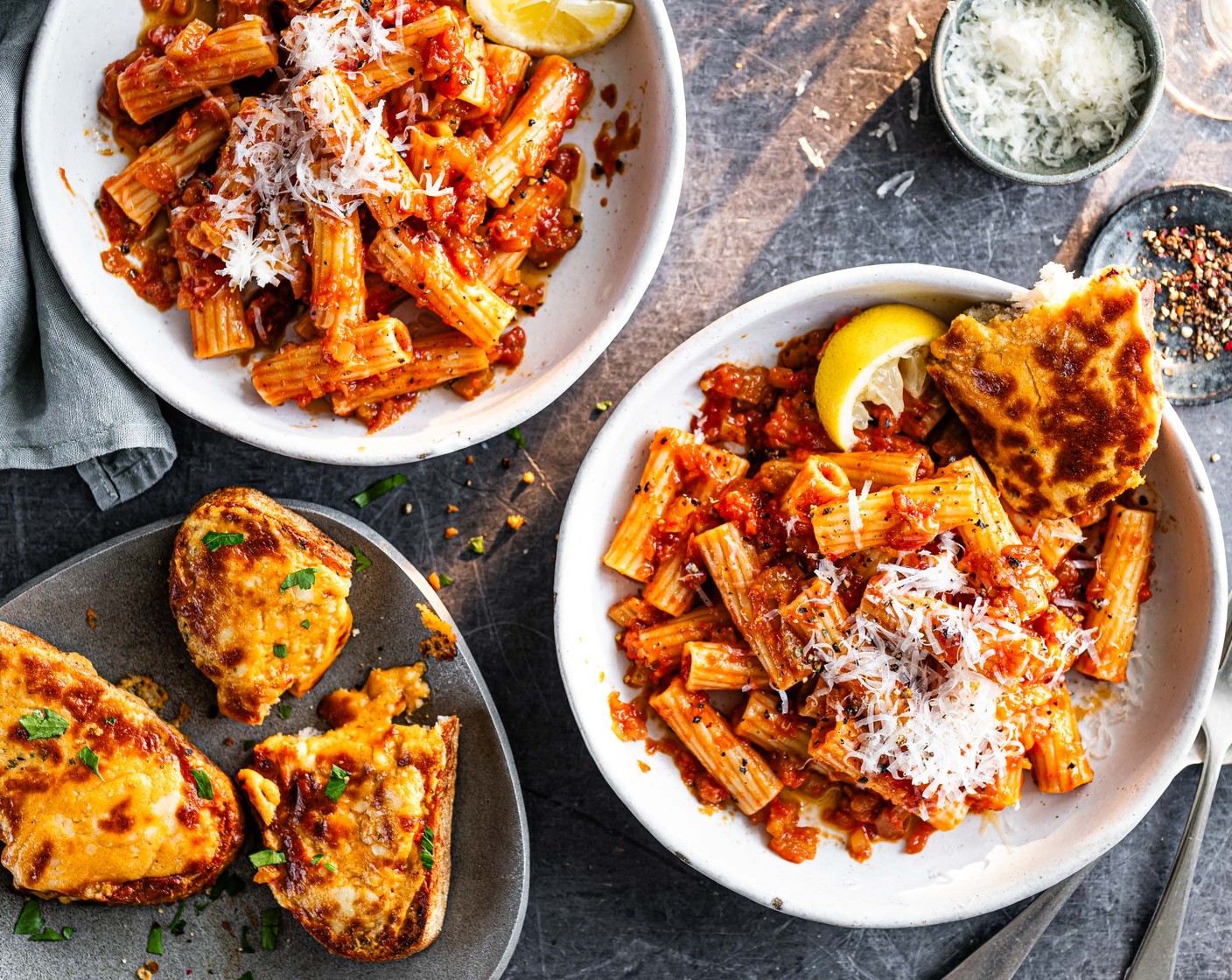 step 8 Serve your pasta garnished with a squeeze of M&S Remarksable Value lemons (as needed), a liberal dusting of parmesan (to taste) and a good amount of freshly cracked black pepper, alongside a slice or two of your Bloody Mary garlic bread.
