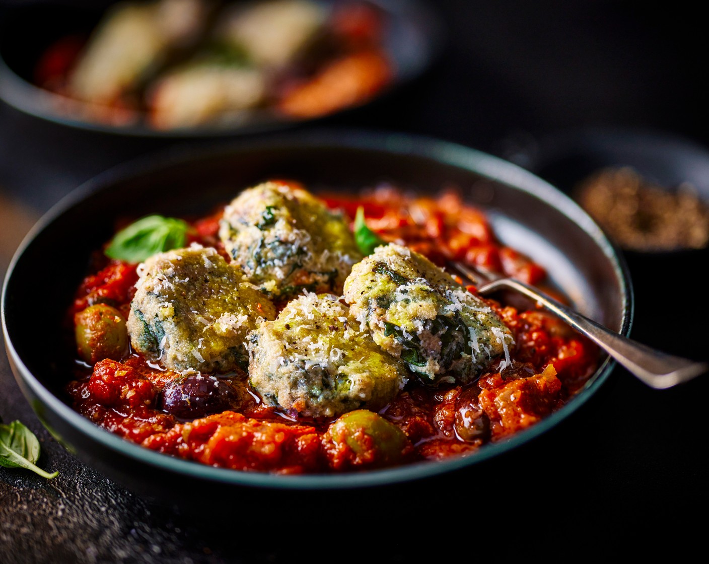 step 8 Serve the sauce in bowls topped with the malfatti and a final scattering of Parmigiano Reggiano.