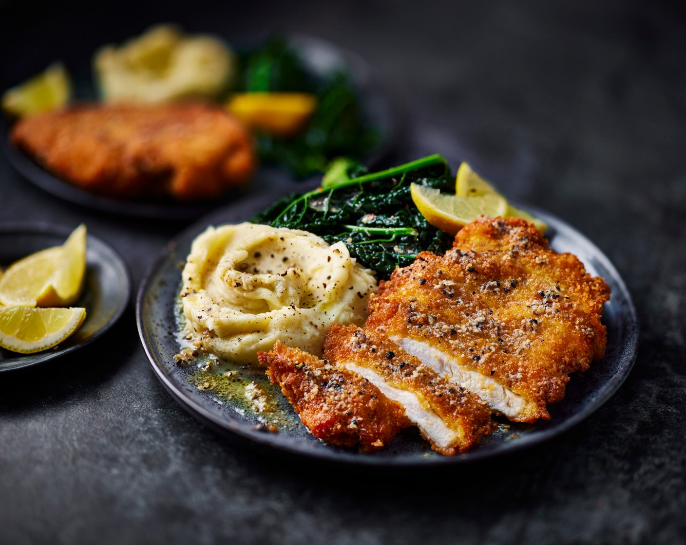 Chicken schnitzel with truffle butter, cavolo nero and mash