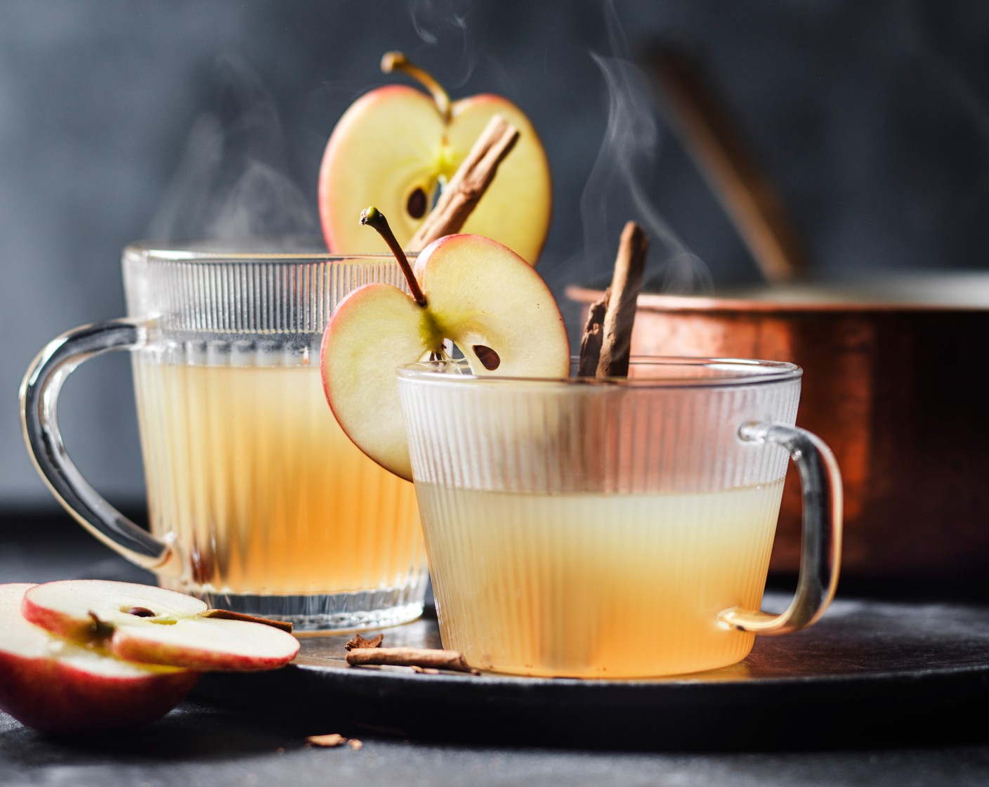 step 1 Add the Armagnac (200 ml), apple juice (200 ml) and lemon juice (1) to a pan and gently warm. Pour into four mugs or tumblers and garnish with a cinnamon stick (4) and a slice of apple (1).