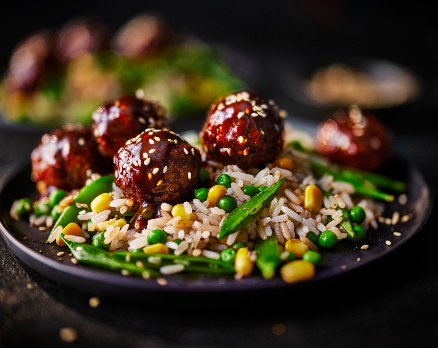 step 5 Serve the rice in bowls, top with the sticky mushroom no‑meatballs and finish with a sprinkling of sesame seeds (1 tbsp).