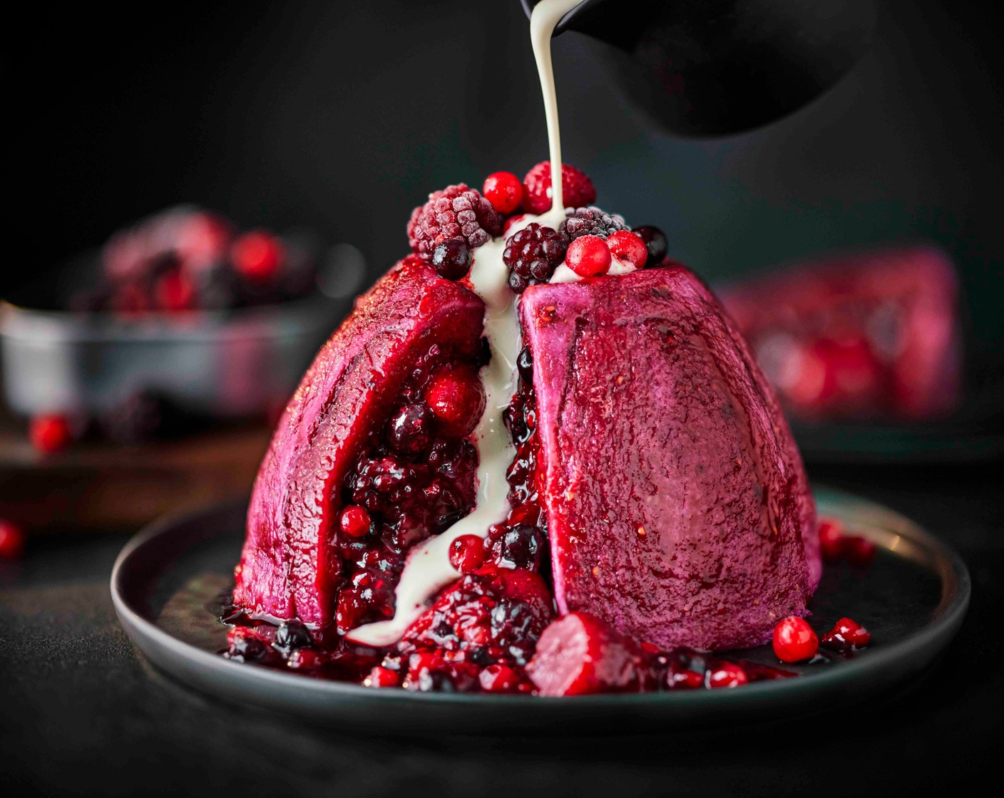 step 7 Turn out the pudding onto a serving plate, top with the remaining berries and serve with cream (as needed).