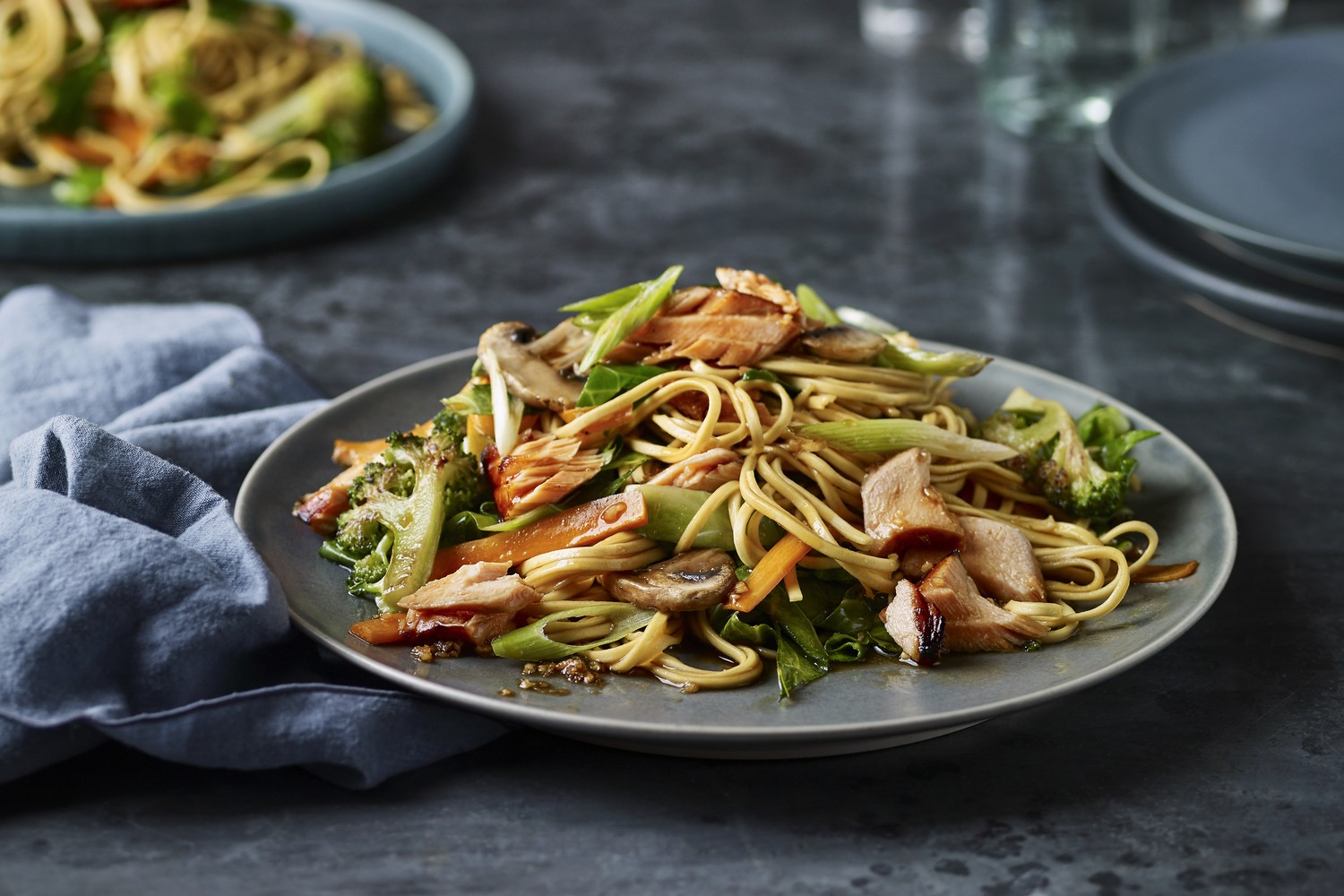 Sticky soy salmon and veggie noodle stir fry