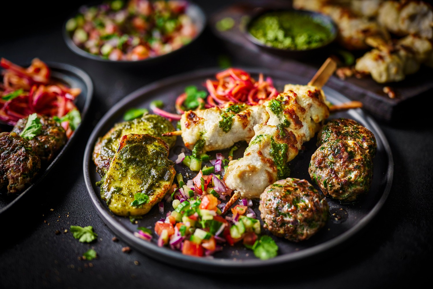 Tandoori grill feast: malai chicken, halloumi tikka and spiced lamb
