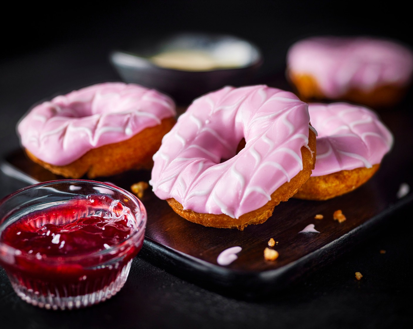 step 12 Serve the doughnuts with the raspberry conserve (3 tbsp) and custard (6 tbsp) dipping sauces.