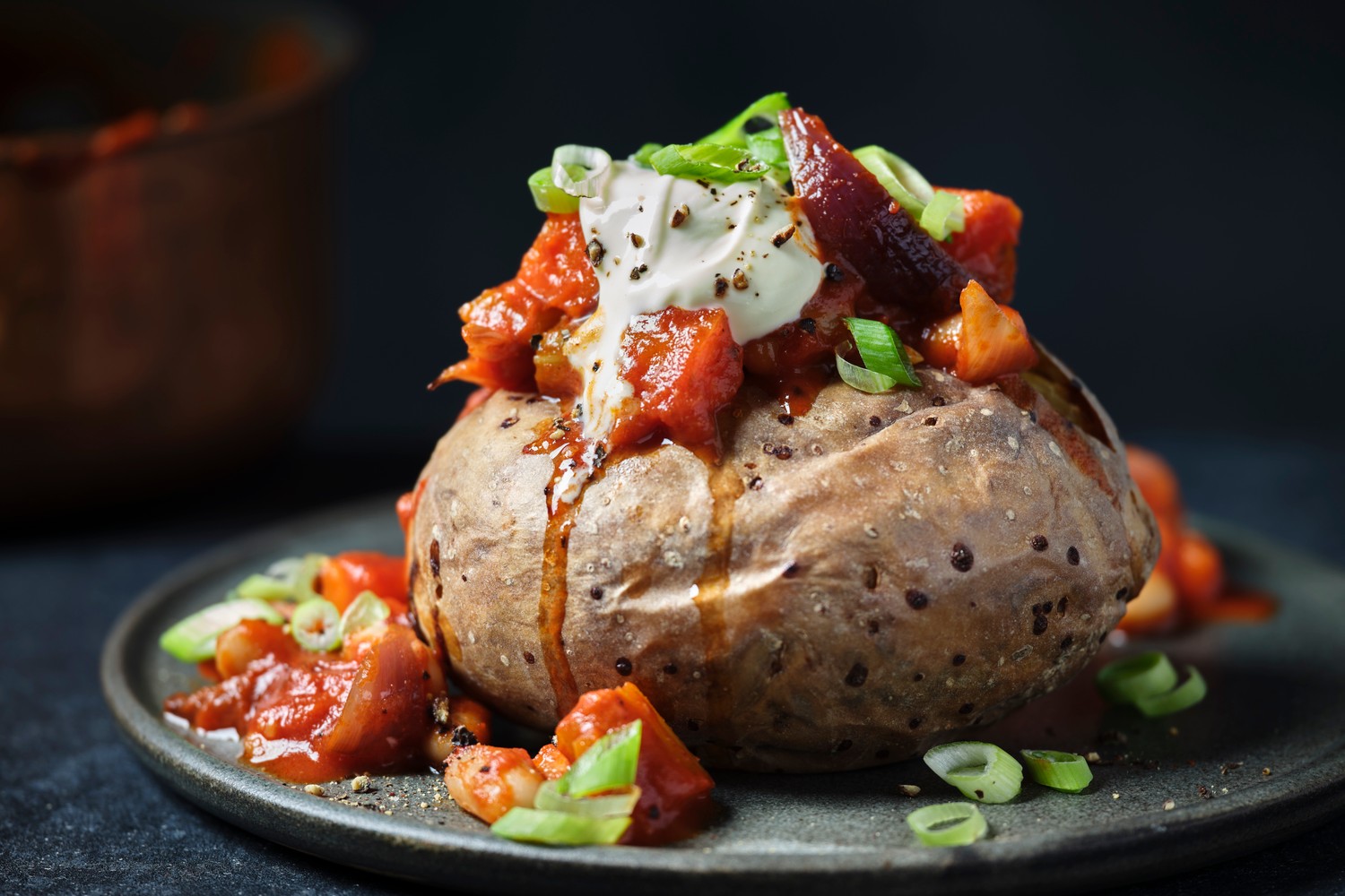 Perfect jacket potatoes with smoky double-chilli bean traybake