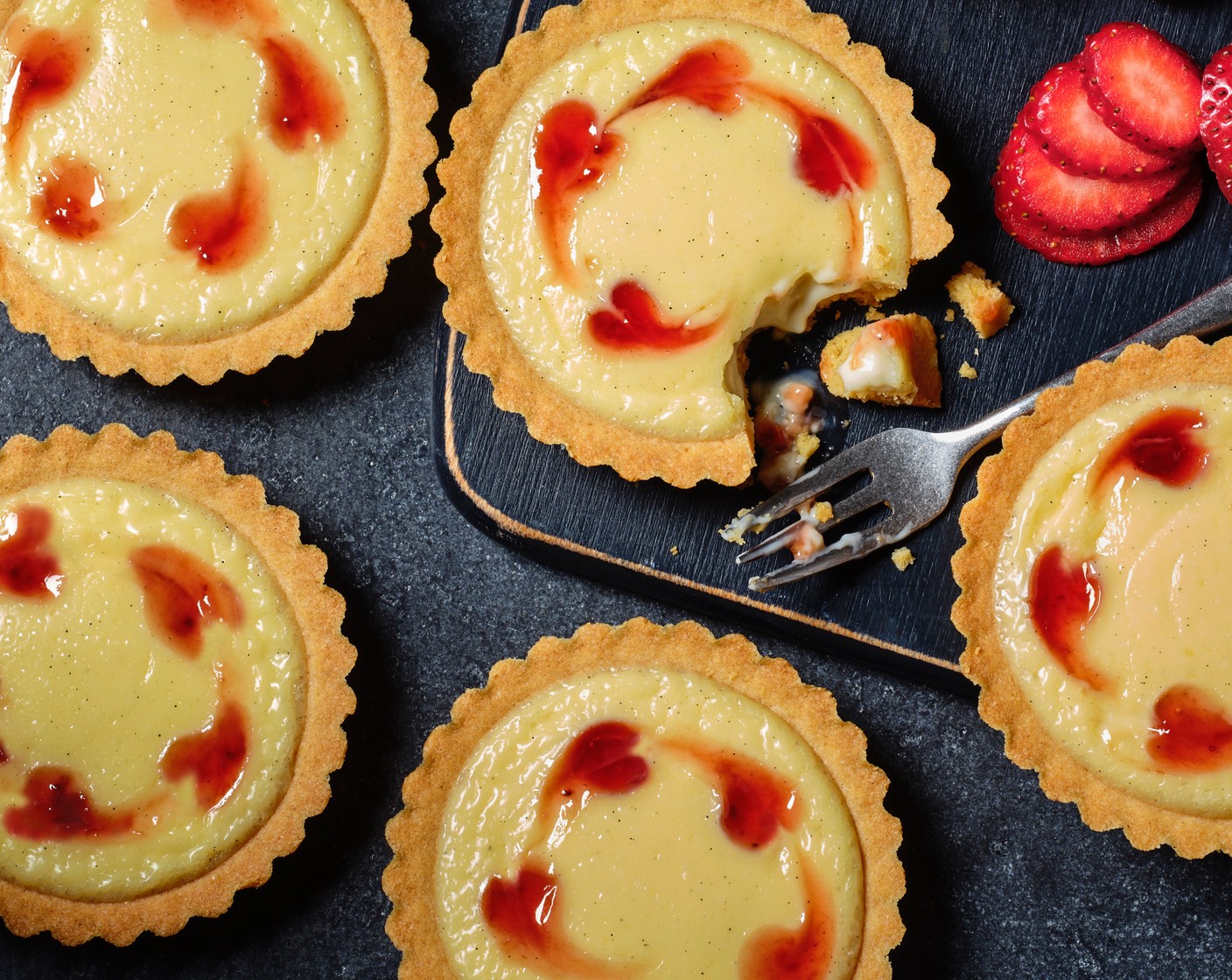 Heart-swirled strawberry custard tarts