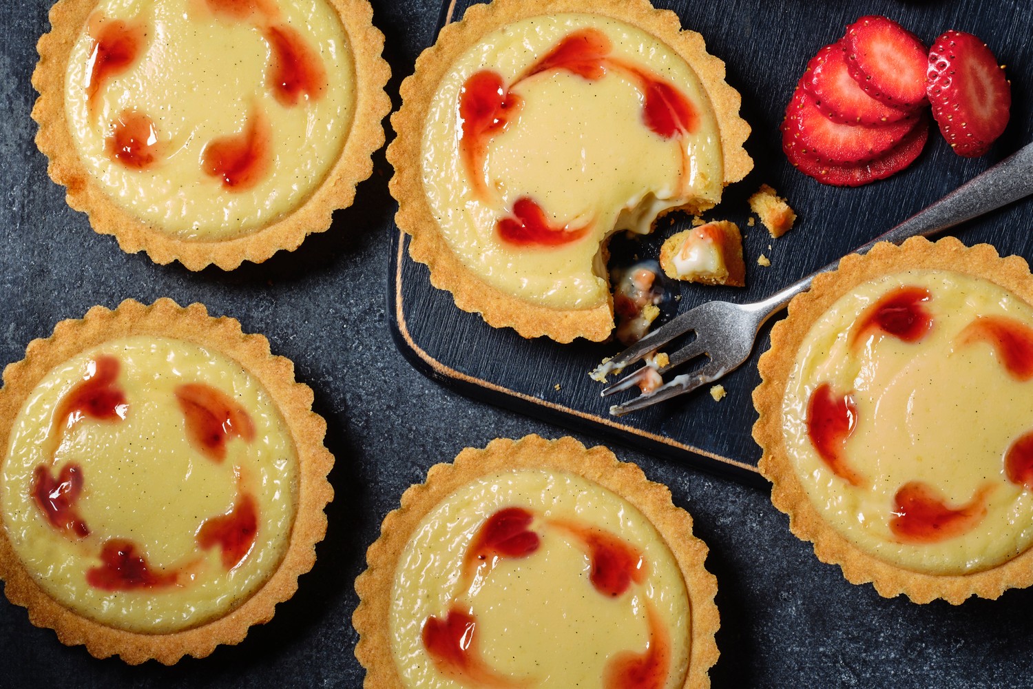 Heart-swirled strawberry custard tarts