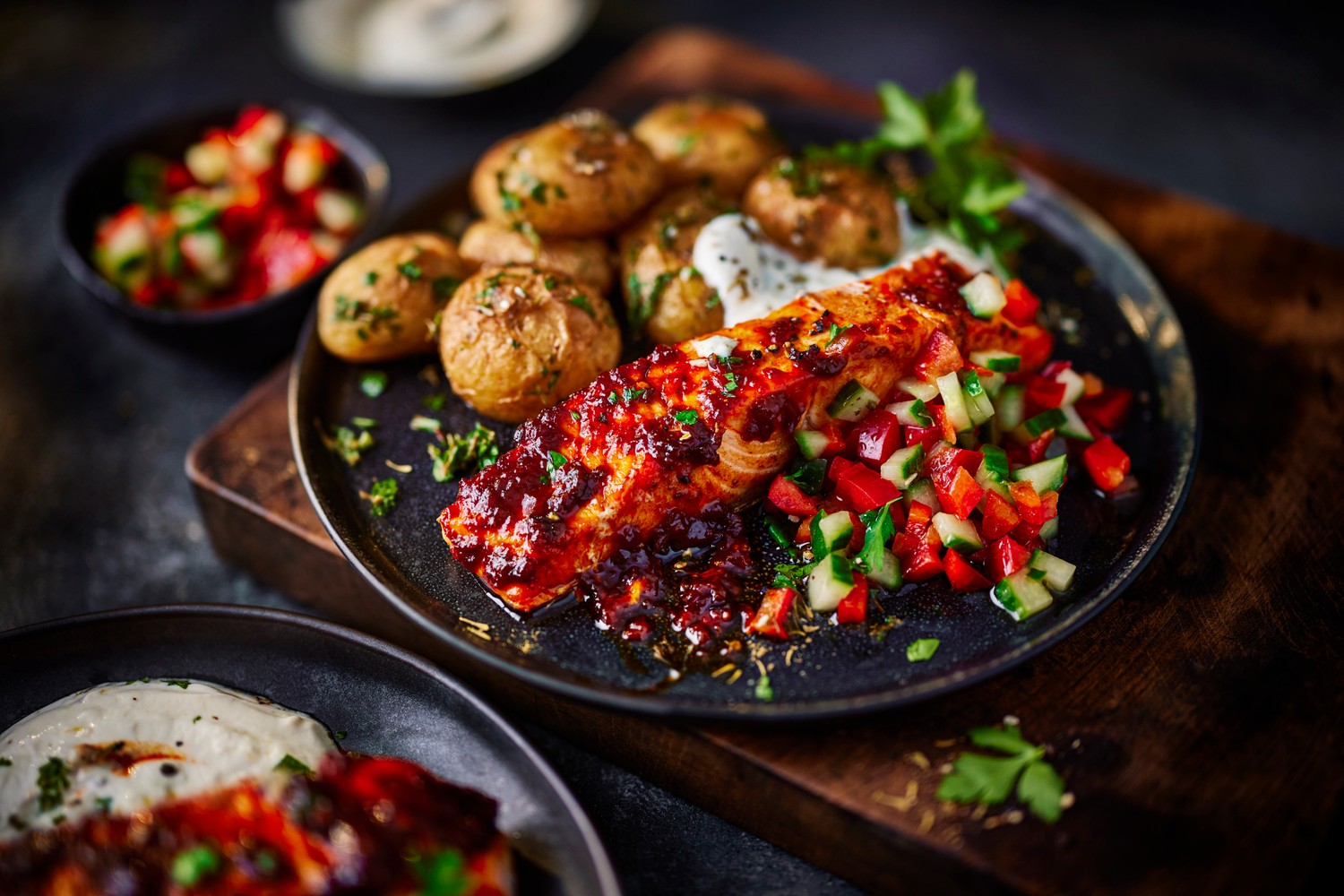 Honey harissa salmon, za’atar roasties and roasted garlic yogurt